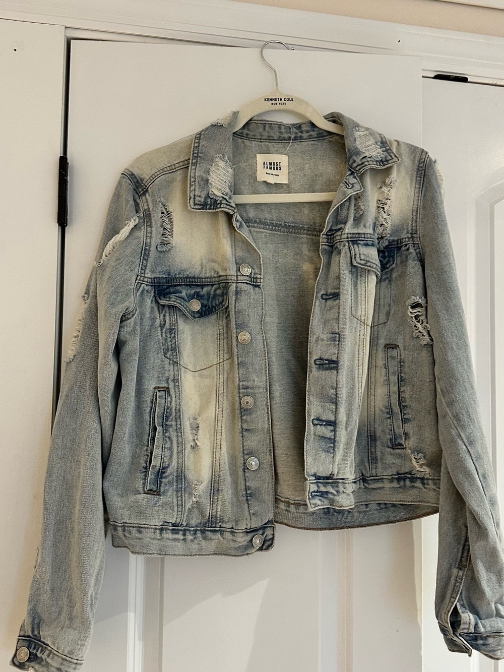 Francesca's Collections Light Wash Distressed Denim Jacket